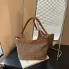 Bolsa de Tecido Vazada para Mulheres 2026 Nova Bolsa de Ombro e Axila de Grande Capacidade Bolsa Tote Versátil para Trabalho e Férias na Praia