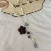 Nuevo Collar con Colgante Multi-Elemento Flor Mariposa Estilo Chino Cadena de Suéter de Cuerda Trenzada Versátil Mariposa Antiguo Retro