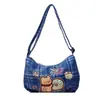 Bolso de hombro para mujer con estampado lindo, nuevo bolso cruzado de lona versátil de moda, bolso de axila moderno para el día a día