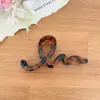 Pinza para el pelo estilo coreano con estampado de leopardo Ins y un diseño de acetato vintage de alta gama, pasador de estilo perezoso para mujer