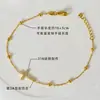 Venta al por mayor del fabricante Pulsera de Acero de Titanio Cruzada Chapada en Oro de 18K para Mujer Cadena Cruzada Clip Pulsera de Bolas Joyería de Moda Popular