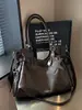 Bolso grande de moda retro para mujer 2026 nuevo bolso casual simple para el antebrazo bolso tote de hombro texturizado para el trabajo