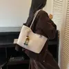 Bolso tote de moda para mujer 2026 nuevo estilo de vacaciones de verano bolso de mano de gran capacidad bolso de hombro para el trabajo bolso de axila