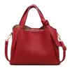 Bolso tipo cubo bandolera de cuero suave, casual y elegante, para mujer, moda verano 2025, patrón granulado, bolso de hombro único de alta gama, cruzado