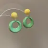 Brincos Redondos Assimétricos de Resina Olho de Tigre Prateados Agulha Design Único Moda Casual Versátil Brincos de Tarraxa para Mulheres