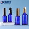 Botella de spray de vidrio azul de 10-100 ml, disponible transfronterizamente, para perfume, aceite esencial, tóner, agua de niebla fina.