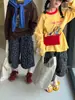Camiseta Infantil Mo Xiaomeng Estilo Outono 2026 Meninos e Meninas Versão Coreana Desenho Carta Manga Curta Gola Redonda Infantil Top Soltinho
