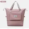 Bolsa deportiva portátil de gran capacidad transfronteriza para fitness, bolsa de viaje diagonal de corta distancia para mujer, bolsa de hombro repelente al agua para yoga, venta al por mayor
