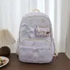 Mochila de alto valor estilo coreano a cuadros doble hombro versátil mochila para estudiantes gran capacidad mochila doble hombro mochila con lazo