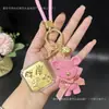 Llavero creativo de oso con detalles dorados, temática de princesa, para la riqueza, la belleza y la fortuna, colgante para bolso, pequeño regalo al por mayor