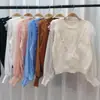 Suéter retro de cuello redondo y manga larga para mujer Primavera y Otoño 2023 nuevo diseño de suéter sentido de diseño nicho top ajustado moda