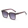 Gafas de Sol Mismo Estilo para Hombres y Mujeres Venta al por Mayor Moda Popular Marco Grande Conducción Anti-UV Gafas de Sol de Marco Grande