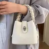 Bolso cubo texturizado de comercio exterior transfronterizo para mujer, 26 modelos nuevos, bolso de mano de alta estética casual, bolso versátil de hombro y cruzado