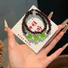 Popular Pulsera de la Suerte con Flor de Estilo Antiguo Chino de Alta Gama 2025 Nuevo Estilo Chino Retro Luna Multicapa Regalo para Mejor Amiga