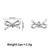 Acero Inoxidable 304 Colgante de Lazo Brillante Hueco DIY Pulsera Collar Bolso Colgante Pequeño Accesorios de Joyería Venta al Por Mayor