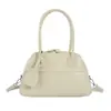 Bolso pequeño de alta gama para mujer, nuevo artículo de otoño 2026, color liso versátil, elegante de un solo hombro, cruzado, bolso de mano, bolso tipo concha