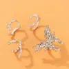 Joyería de comercio exterior de Amazon anillo creativo de mariposa geométrica de metal pesado personalidad irregular juego de cuatro anillos