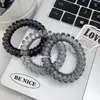 Elegante anillo de pelo de línea telefónica transparente de color claro para viento frío negro ins alto valor de color no daña el pelo cuerda para el pelo sin costuras