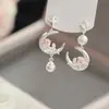 Aretes de borla de perla de luna rosa estilo francés para mujer, diseño de nicho, elegantes y con estilo, nuevos aretes 2026