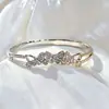 Nuevo Pulsera de Mariposa Hueca con Nudo de Zirconia Elegante Bicolor Oro y Plata Accesorios de Lujo Ligero para Mujer Venta al por Mayor Directa de Fábrica