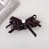 Falda coreana dulce y fresca con estampado de leopardo Pin de plátano 2025 Nuevo Clip elegante para coleta Accesorios para el cabello con clip de alta gama para mujer