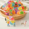 Molino de viento colorido palito corto caramelo de fruta caja 100 PIEZAS red popular alto valor de color caramelo duro cortado a mano