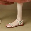 Sandalias de perlas estilo Chanel para mujer, para uso exterior en verano, suela plana suave, nuevas sandalias de una tira de moda 2026 que no cansan los pies