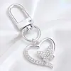 Lujo Ligero Chapado en Oro Full Diamante Charm Hebilla en Forma de D Colgante Hueco en Forma de Corazón Accesorios para Bolsos Llaves Fábrica Stock Mayorista