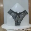 Tanga sexy de encaje europeo y americano para mujer, cintura baja, cadera, lazo, lencería sexy sexy, venta al por mayor, generación