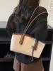 Bolso Retro de Nicho para Mujer Otoño 2025 Nuevo Moda de Nicho Estampado de Leopardo Simple para Viajar Bolso de Hombro/Axila Tote