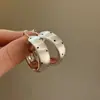 Brincos ovais multicamadas em forma de diamante com pingo de óleo e poá em agulha de prata, com toque de luxo leve e de alta qualidade, brincos modernos e versáteis