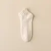 Calcetines de barco que no sueltan pelusa, calcetines de forro polar coral de color sólido, calcetines gruesos cálidos de invierno para mujer, calcetines antideslizantes de silicona para el hogar