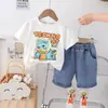 2024 Nuevo Verano Niños Dibujos Animados Cuello Redondo Manga Corta Bebé Niño Casual Pantalones Cortos de Mezclilla Conjunto de Dos Piezas Fabricante Venta al por Mayor
