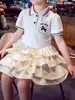Vestido de Niña Verano 2026 Nuevo Estilo Estilo Academia Infantil Cuello Polo Vestido de Princesa Atuendo de Verano para Niñas Mayores Vestido de Pastel