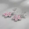 Venta Caliente Aretes Pequeños Frescos y Dulces de Zirconia Rosa Flor de Mariposa Lujo Ligero Gama Alta Versátiles de Temperamento Venta al por Mayor