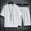 Traje waffle deportivo de verano casual holgado falso de dos piezas camiseta de media manga de seda de hielo conjunto de pantalones capri versátil