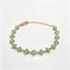 Pulseras de flor de acero de titanio con incrustaciones de diamantes, las más vendidas en Europa y América, accesorios de lujo ligero de nicho, cadenas para la clavícula, pulseras de trébol de cuatro hojas, venta al por mayor desde el fabricante
