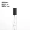 Botella pulverizadora transparente y delgada de 17 mm con tapa de rosca, para dispensar pequeñas cantidades, con tapa negra, hecha de vidrio engrosado y con mecanismo de botón pulsador.