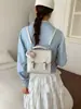 Mochila Novedad Primavera 2026 Estilo Coreano Nicho Linda con Relieve para Mujer, Bolso de Mano Versátil Ligero para Viajes