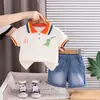 Traje de Verano para Niños de Comercio Exterior Dinosaurio Cuello Redondo Manga Corta Pantalones Cortos de Mezclilla de Algodón Traje Moda para Bebé Ropa para Niños Niños de Moda