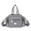 Nova Bolsa Feminina Tecido de Nylon Bolsa Transversal Bolsa de Mão Multifuncional Bolsa de Ombro Estilo Coreano Versátil Bolsa Quadrada Pequena de Tecido Oxford