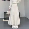 Saia Plissada de Tricô Feminina Outono Inverno 2026 Nova Cintura Alta Cobre os Quadris Emagrecedora Grande Flare Franja Linha A Saia Guarda-chuva Saia Longa