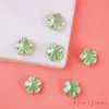 Color flor de cinco pétalos cerámica cuentas sueltas Macaron lindas cuentas perforadas pulsera collar DIY accesorios al por mayor