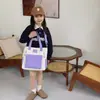 Bolso Coreano de Bloques de Color de un Solo Hombro para Niños y Niñas, Elegante Bolso Grande de Gran Capacidad para Estudiantes de Primaria, Bolso Trendy para Padres e Hijos 2026