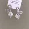 Pendientes Redondos Plegados con Borlas Tachonados de Pedrería Estilo Retro Europeo y Americano, de Moda y Versátiles, con un Toque de Lujo Ligero y de Alta Gama