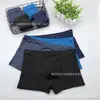 Ropa interior masculina caliente de seda de leche elástica con estampado calzoncillos modelo de mercado nocturno 5 yuanes venta al por mayor directa de fábrica