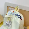 Mochila al por mayor estilo coreano estilo universitario versátil para ir al trabajo y a la escuela para mujer alta apariencia gran capacidad mochila casual escolar
