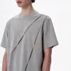 Camiseta de Manga Corta para Hombre 2026 Verano Nuevo Corte Especial Plisado Diagonal Empalme Estilo Boxy