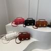 2024 Novo inverno estilo ocidental em relevo desenho animado nicho francês bolsa de travesseiro portátil bolsa de ombro feminina bolsa crossbody