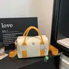 2026 Nueva Moda Bolso de Hombro Único Estilo Coreano para Mujer Alta Apariencia Bolso de Mano Tipo Almohada Casual Ligero para Viaje Bolso Cruzado